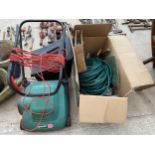 AN ASSORTMENT OF GARDEN ITEMS TO INCLUDE AN ELECTRIC QUALCAST MOWER, HOSE PIPE ETC