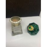 TWO VINTAGE PERFUME BOTTLES - ONE CUT GLASS WITH A HALLMARKED BIRMINGHAM SILVER AND ENAMEL TOP AND