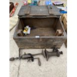 A WOODEN TOOL CHEST WITH A IXION BRACE DRILL AND A BOTTLE JACK