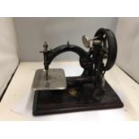 A VINTAGE WILLCOX AND GIBBS NEW YORK SEWING MACHINE