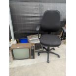 A RETRO TELEVISION, A HEATER AND AN OFFICE CHAIR