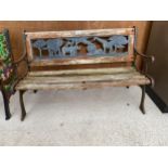 A VINTAGE CHILDS GARDEN BENCH WITH CAST ENDS AND DECORATIVE ANIMAL SCENE BACK