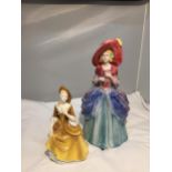 TWO CERAMIC FIGURES TO INCLUDE A ROYAL DOULTON 'SANDRA' HN2275 AND A TALLER CERAMIC FIGURE OF A LADY