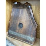 A VINTAGE WOODEN PIANO CHORD INSTRUMENT
