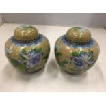 A PAIR OF CLOISONNE GINGER JARS WITH LIDS