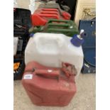 FOUR VINTAGE METAL JERRY CANS AND A PLASTIC WATER CONTAINER