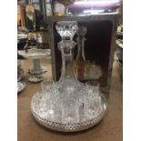 A CRYSTAL DECANTER AND GLASSES ON A SILVER PLATED GALLERY TRAY WITH BOX BY THE JEWELLERS COLLECTION