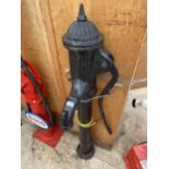 A VINTAGE CAST IRON WATER PUMP