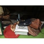 A LARGE QUANTITY OF FASHION BAGS TO INCLUDE, SHOULDER BAGS, LAPTOP BAGS, SHOPPERS, ETC