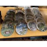 TWENTY FOUR COLLECTABLE CABINET/WALL PLATES TO INCLUDE, FRANKLIN PORCELAIN 'THE WOODLAND YEAR',