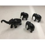 FOUR SMALL CARVED EBONY ELEPHANTS HEIGHT 6CM