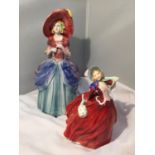 TWO FIGURINES ONE A ROYAL DOULTON AUTUMN BREEZES HN 1934 (A/F) AND A FURTHER LADY