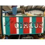 A WOODEN WELCOME TO THE CIRCUS SIGN 70CM X 30CM