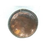 A VERY LARGE COPPER ALMS DISH 54CM DIAMETER