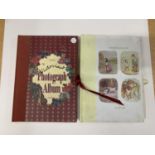 TWO PHOTOGRAPH ALBUMS TO INCLUDE A BEATRIX POTTER AND A VICTORIANA