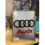 A SILVER COLOURED AUDI PETROL CAN WITH BRASS STOPPER