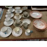 A QUANTITY OF CUPS AND SAUCERS TO INCLUDE ORIENTAL STYLE, FLORAL DESIGN, ETC