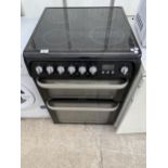 A BLACK ELECTRIC FREESTANDING OVEN AND HOB BELIEVED WORKING BUT NO WARRANTY