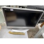 A PANASONIC 26" TELEVISION WITH REMOTE CONTROL