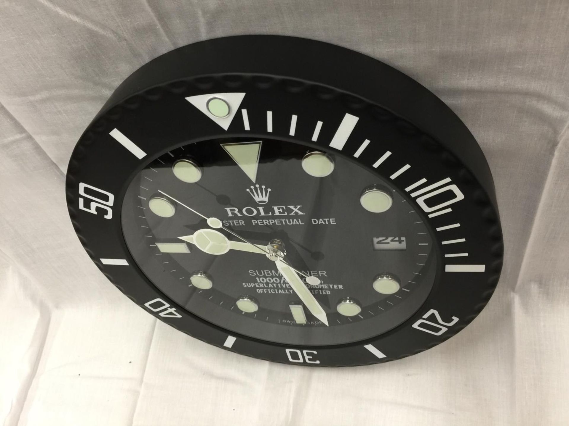 A BLACK DEALERS WALL CLOCK - Image 2 of 2