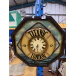 A LARGE HEXAGONAL CLOCK DEPICTING THE TITANIC LIFE RING 61CM DIAMETER