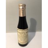 A MARCH 1974 BOTTLE OF THOMAS HARDY'S ALE 6 FL. OZ