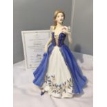A ROYAL DOULTON LADY OF THE YEAR 'LOUISA' WITH CERTIFICATE OF AUTHENTICITY