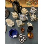 A COLLECTION OF TEAPOTS, JUGS, ETC.