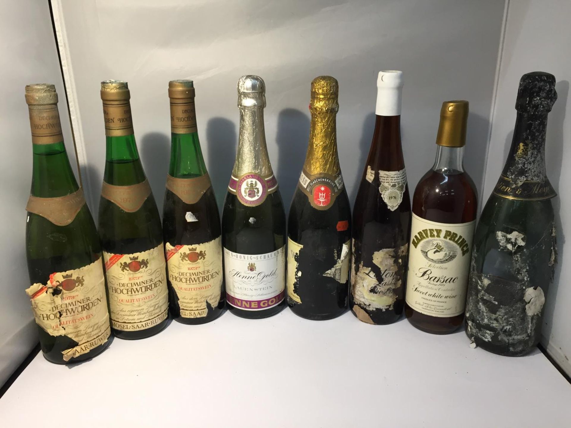 EIGHT BOTTLES OF VINTAGE WINE TO INCLUDE 1973 DECIMINER HOCHWURDEN, 1974 HARVEY PRINCE BARSAC, HENNE