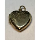 A 9 CARAT GOLD HEART SHAPED LOCKET PENDANT GROSS WEIGHT 2.66 GRAMS