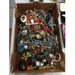 A LARGE BOX OF COSTUME JEWELLERY TO INCLUDE BANGLES, BEADS, NECKLACES, ETC