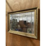TWO DECORATIVE GILT FRAMED WALL MIRRORS