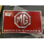 A CHROME AND RED MG MORRIS GARAGES SIGN 29CM X 17CM