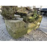 A LARGE STONE TROUGH (122CM X 74CM X 50CM)