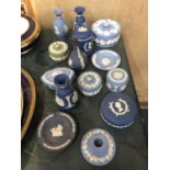 FOURTEEN PIECES OF WEDGWOOD JASPERWARE TO INCLUDE TRINKET BOXES, VASES, CANDLESTICK, ETC