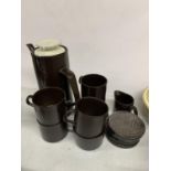 A RETRO LOOKING COFFEE POT, SIX CUPS, CREAM JUG AND COASTERS