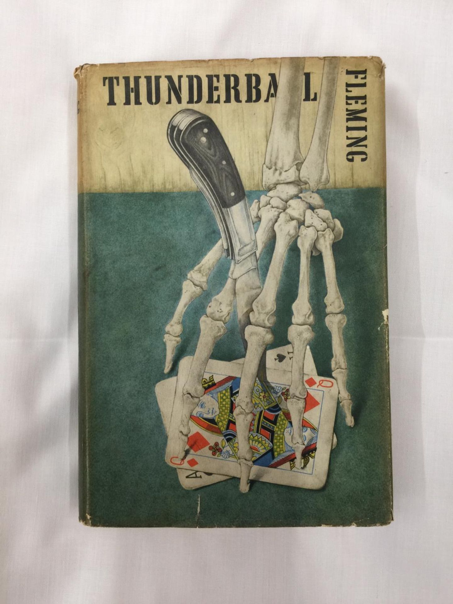 A FIRST EDITION JAMES BOND NOVEL - THUNDERBALL BY IAN FLEMING, HARDBACK WITH ORIGINAL DUST