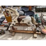 A VINTAGE CHILDS ROCKING HORSE BEARING THE STAMP C.W.J COOKSEY FECIT (A/F)