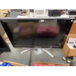 A TOSHIBA 37" TELEVISION WITH REMOTE CONTROL