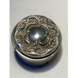 A HALLMARKED BIRMINGHAM SILVER PILL BOX WITH ORNATE TOP