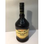 A 1 LITRE BOTTLE OF CAROLANS FINEST BLEND OF IRISH CREAM, MADE-WINE AND HONEY. PRODUCE OF IRELAND