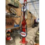 A ESSO PETROL PUMP WITH BRASS NOZZLE