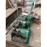 A QUALCAST CLASSIC PETROL 43S LAWN MOWER WITH GRASS BOX