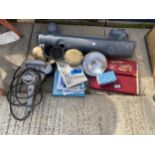 AN ASSORTMENT OF AUTOMOBILE ITEMS TO INCLUDE LIGHTS, MANUALS AND BUFFING PADS ETC