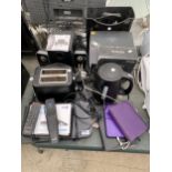 A LARGE ASSORTMENT OF ITEMS TO INCLUDE A LOGITECH SPEAKER SET, TOASTER AND TABLETS ETC