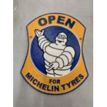 A CAST 'OPEN FOR MICHELIN TYRES' SIGN