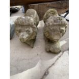 A PAIR OF RECONSTITUTED STONE LION FIGURES (A/F)