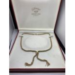 A 9 CARAT GOLD WHITE AND YELLOW GOLD ROPE NECKLACE WITH TASSELS IN ORIGINAL PRESENTATION BOX WITH