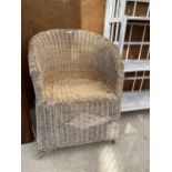 A WICKER CONSERVATORY ARM CHAIR
