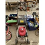 A HONDA EASY START PETROL LAWN MOWER WITH GRASS BOX